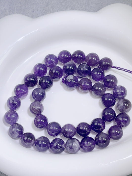 天然石連材--ビーズ-10 mm紫水(綿入り)