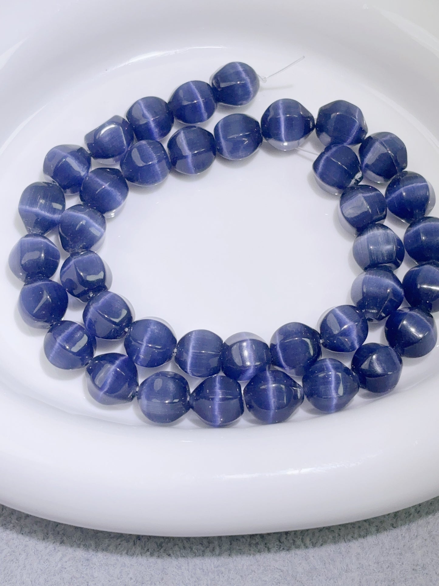 天然石連材-随形珠-10 mm深スミレキャッツアイ石