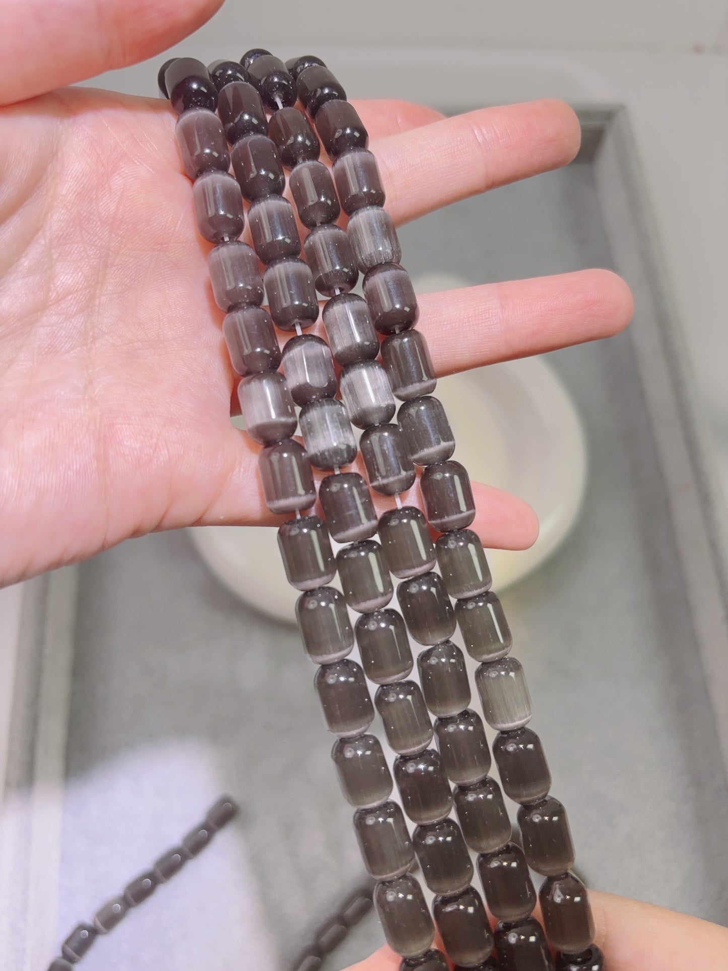 天然石連材-バケツビーズ-8 x 10 mm黒色猫目石