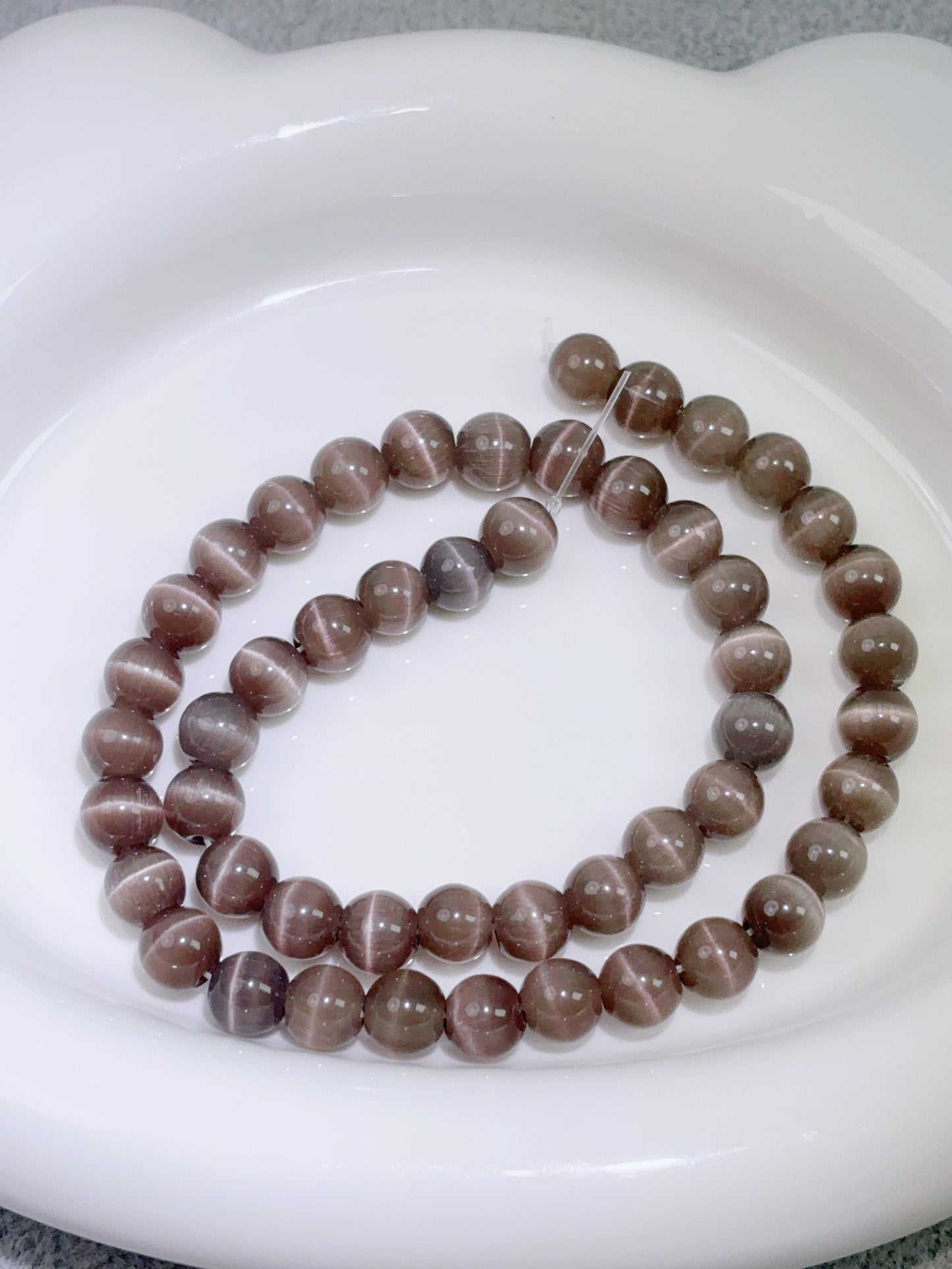 天然石連材-円珠-8 mm茶色猫目石