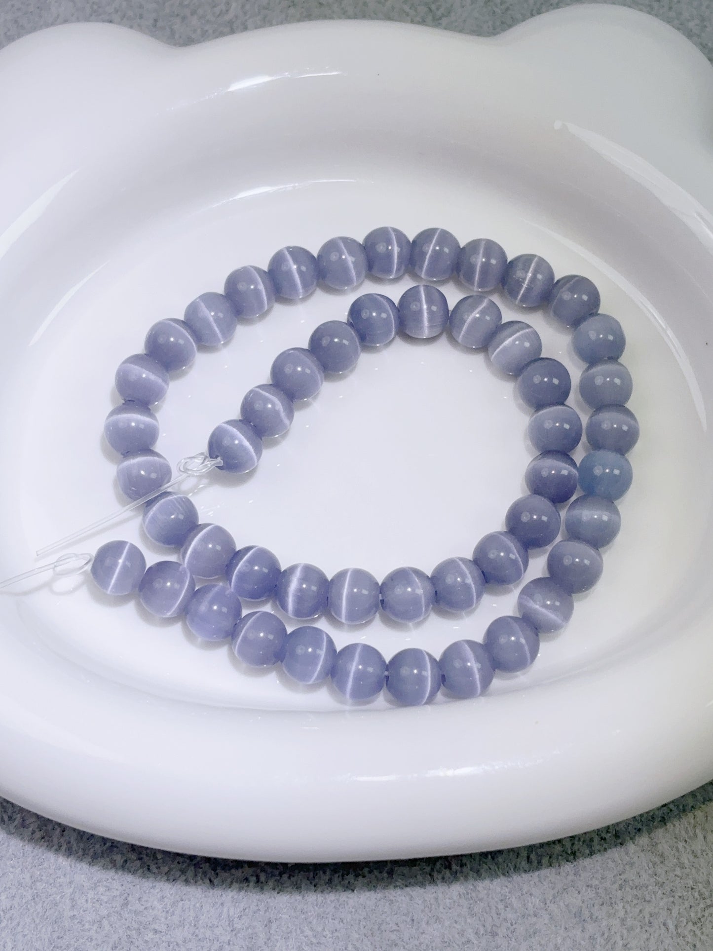 天然石連材-ビーズ-8 mm淡紫ローランド キャッツアイ