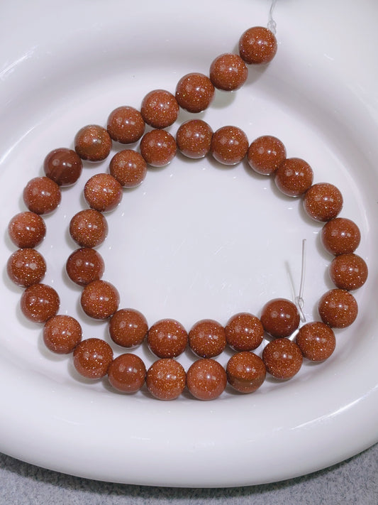 天然石連材-ビーズ-10 mm金砂石