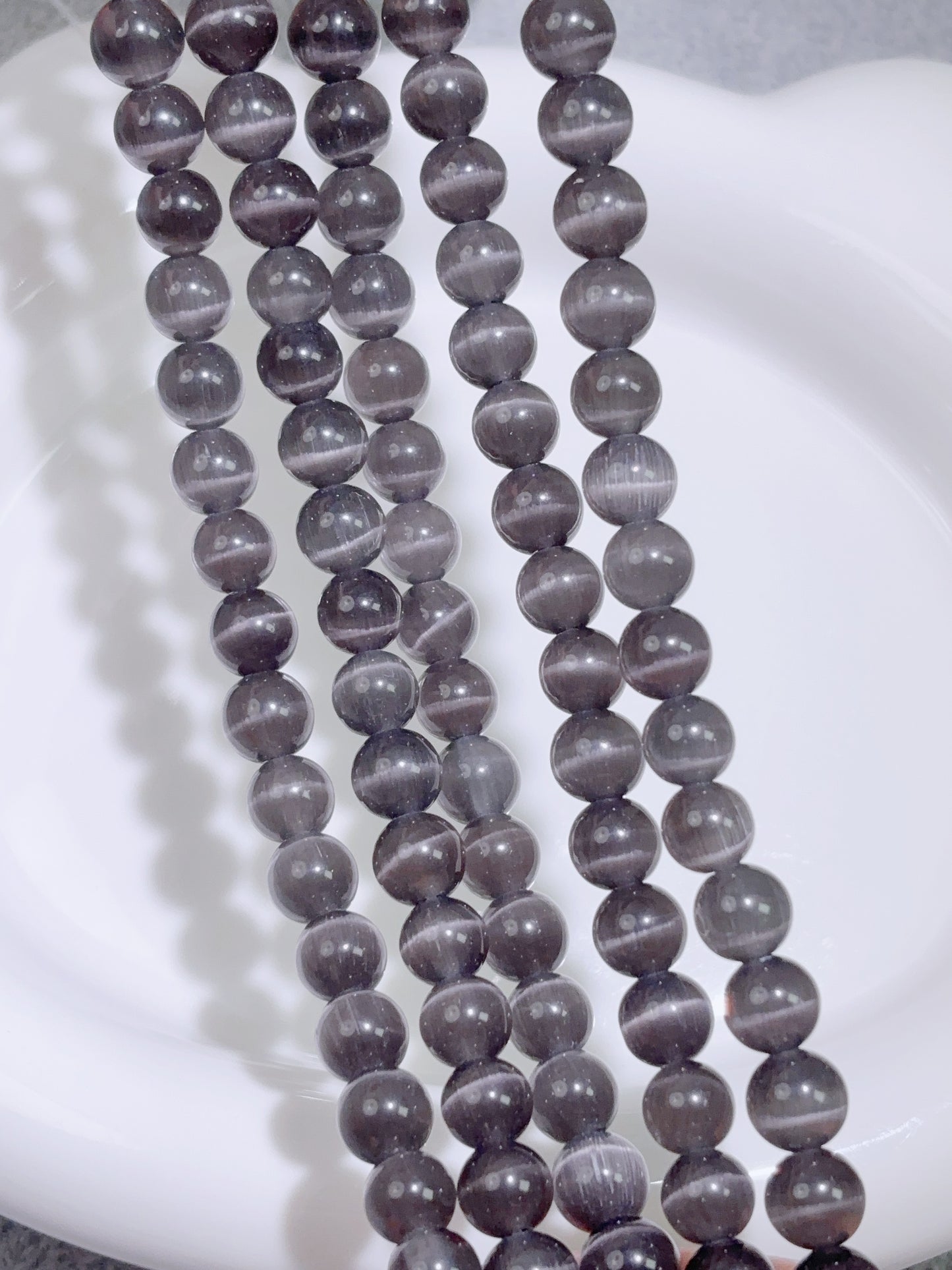 天然石連材-ビーズ-8 mm黒色キャッツアイ