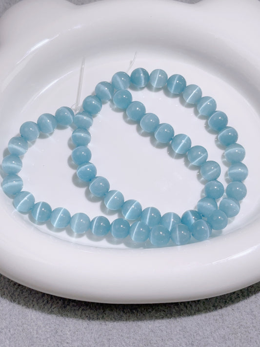 天然石連材-円玉-8 mm青色猫眼石