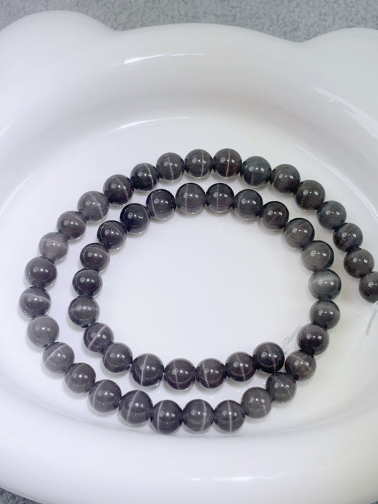 天然石連材-ビーズ-8 mm黒色キャッツアイ